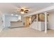 Finished basement with stairs, bar, and tile flooring at 325 Northfield Dr, Raleigh, NC 27609