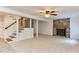 Finished basement with stairs and fireplace at 325 Northfield Dr, Raleigh, NC 27609