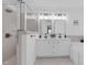 Bright bathroom with double sink vanity, soaking tub, and glass shower at 3713 Highland Creek Dr, Apex, NC 27539