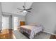 Bright primary bedroom with a ceiling fan and plenty of space at 3713 Highland Creek Dr, Apex, NC 27539