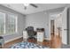 Bedroom featuring a desk, chair, and hardwood floors at 3713 Highland Creek Dr, Apex, NC 27539
