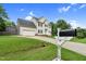 Beautiful two-story home with blue shutters, attached garage, manicured lawn, and mailbox with house number at 3713 Highland Creek Dr, Apex, NC 27539