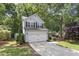 Two-story home with a manicured front yard and a two-car garage at 425 Hidden Cellars Dr, Holly Springs, NC 27540
