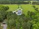Stunning aerial shot showcasing a home with a pool and extensive grounds at 4737 Uzzle Rd, Rougemont, NC 27572