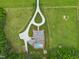 Expansive property featuring a home with a pool and long driveway, surrounded by lush green pastures and mature trees at 4737 Uzzle Rd, Rougemont, NC 27572