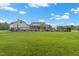 Beautiful home with spacious backyard featuring a pool, screened porch, and meticulously maintained lawn at 4737 Uzzle Rd, Rougemont, NC 27572