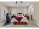 Bedroom featuring exercise equipment, windows, and carpet at 4737 Uzzle Rd, Rougemont, NC 27572