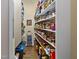 Walk-in pantry features ample shelving, providing plenty of storage space at 4737 Uzzle Rd, Rougemont, NC 27572