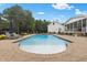 Backyard pool featuring a tanning ledge and brick paver surround at 4737 Uzzle Rd, Rougemont, NC 27572