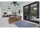 Spacious screened-in porch offering comfortable seating and scenic views of the pool and backyard at 4737 Uzzle Rd, Rougemont, NC 27572