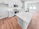 Stylish kitchen island featuring modern fixtures, countertops, and stainless appliances at 477 Beacon Hill Rd # 29, Lillington, NC 27546