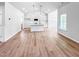 Bright and airy living room featuring open floor plan with an eat-in kitchen, and plenty of natural light at 477 Beacon Hill Rd # 29, Lillington, NC 27546