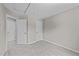 Bedroom features carpeting, neutral walls, and multiple doorways leading to other rooms at 5012 Silverdene St, Raleigh, NC 27616