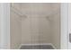 Empty walk-in closet with white wire shelving and gray carpet at 5012 Silverdene St, Raleigh, NC 27616