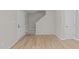 Entryway featuring modern wood flooring, neutral paint and staircase at 5012 Silverdene St, Raleigh, NC 27616