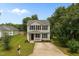 Charming two-story home featuring a well-maintained lawn and a classic design at 5012 Silverdene St, Raleigh, NC 27616