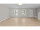Spacious and bright living area with modern wood floors and natural light at 5012 Silverdene St, Raleigh, NC 27616