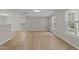 Bright living room featuring wood floors, neutral paint and lots of natural light at 5012 Silverdene St, Raleigh, NC 27616