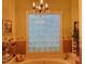 Well lit bathroom featuring a glass block window and soaker tub at 526 Bob Rainey Trl, Burlington, NC 27217