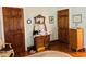 Bedroom featuring antique furnishings, wood floors and lovely decor at 526 Bob Rainey Trl, Burlington, NC 27217