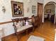 Cozy living room features a classic wooden bench with patterned cushions and antique decorations at 526 Bob Rainey Trl, Burlington, NC 27217