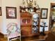 Charming living room with an antique cabinet, vintage chair, and decorative accents at 526 Bob Rainey Trl, Burlington, NC 27217