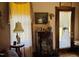 Bright living room with vintage decor, decorative curtains, and classic interior design at 526 Bob Rainey Trl, Burlington, NC 27217