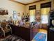 Office with custom desk, plenty of storage and natural light at 526 Bob Rainey Trl, Burlington, NC 27217