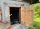 Shed interior view shows open door at 526 Bob Rainey Trl, Burlington, NC 27217