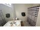 Bathroom featuring a large mirror, vanity, and a shower with a striped curtain at 6005 Namozine Ct, Raleigh, NC 27610