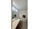 Bathroom with vanity, mirror, and shower with striped curtain at 6005 Namozine Ct, Raleigh, NC 27610