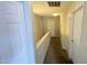 Upstairs hallway showing multiple doors and access to rooms at 6005 Namozine Ct, Raleigh, NC 27610