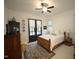 Cozy bedroom features beautiful decor, a comfortable bed, and outdoor patio access at 615 Sampson St, Raleigh, NC 27609