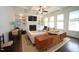 Cozy living room with built-in shelves, a fireplace, coffered ceilings, and large windows for natural light at 615 Sampson St, Raleigh, NC 27609