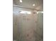 Bright shower features dual shower heads, marble-tiled walls, and built-in soap niches at 615 Sampson St, Raleigh, NC 27609