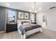 Comfortable bedroom with decorative wallpaper, recessed lighting, and ensuite bath at 66 Renshaw Dr, Fuquay Varina, NC 27526