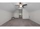 Large bonus room with neutral walls, carpet, ceiling fan and good lighting at 7055 Nc-242, Dunn, NC 28334