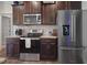 The gourmet kitchen features stainless steel appliances, granite counter tops, and modern fixtures at 7055 Nc-242, Dunn, NC 28334