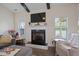 Inviting living room featuring a fireplace, and neutral decor, perfect for relaxation and gatherings at 7055 Nc-242, Dunn, NC 28334