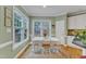 Bright eat-in kitchen with hardwood flooring, neutral walls, many windows and view to the backyard at 7613 Percy Ct, Raleigh, NC 27613