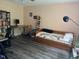 Versatile bedroom featuring a desk, a daybed, and ample natural light at 875 Martin Luther King Jr. Blvd # 15, Chapel Hill, NC 27514
