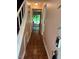 Inviting hallway featuring tile flooring and access to a bright, sunlit area at 875 Martin Luther King Jr. Blvd # 15, Chapel Hill, NC 27514