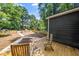 Backyard deck featuring patio furniture, and offering backyard views of lawn and fence at 924 W Trinity Ave, Durham, NC 27701