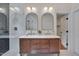 Modern bathroom with dual vanity, walk-in shower, and stylish mirrors at 924 W Trinity Ave, Durham, NC 27701