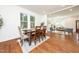 Cozy dining area with a table set for four, open to the living room at 924 W Trinity Ave, Durham, NC 27701