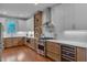 Gourmet kitchen with stainless steel appliances, custom cabinetry, and sleek countertops at 924 W Trinity Ave, Durham, NC 27701