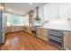 Gourmet kitchen with stainless steel appliances and custom cabinetry at 924 W Trinity Ave, Durham, NC 27701