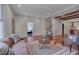 Spacious living room with hardwood floors and an open layout to the staircase and kitchen at 924 W Trinity Ave, Durham, NC 27701