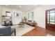 Comfortable living room with fireplace and natural light at 924 W Trinity Ave, Durham, NC 27701