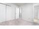 Bedroom view includes closet, bathroom, and doorway to another room at 105 Sir Richard Ln, Chapel Hill, NC 27517